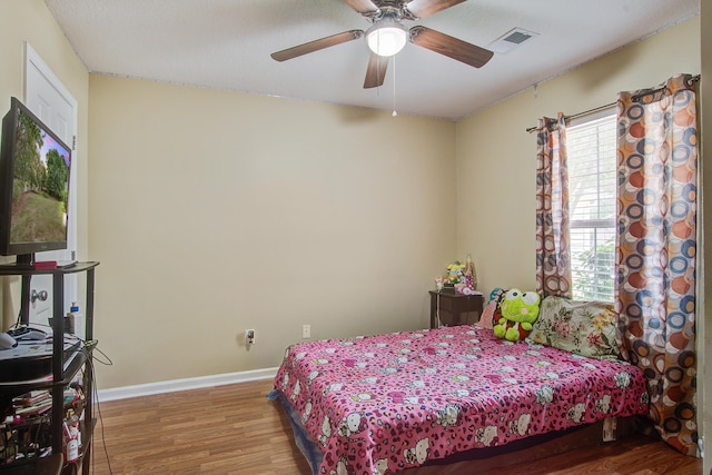 7896 Montview Rd, North Charleston, SC 29418 - bedroom featuring wood finished floors, baseboards, and ceiling fan