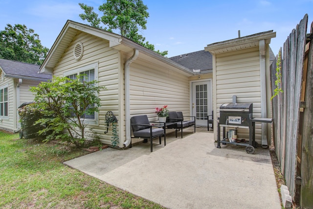 7896 Montview Rd, North Charleston, SC 29418 - back of house featuring a patio, a shingled roof, and outdoor lounge area