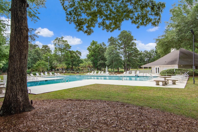 7896 Montview Rd, North Charleston, SC 29418 - community pool featuring a patio, a yard, and view of scattered trees