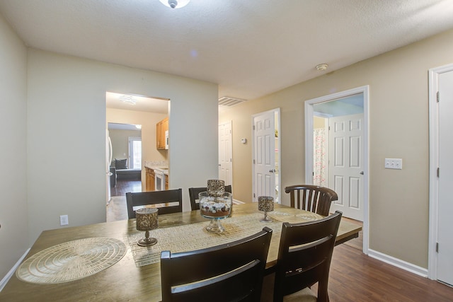 7896 Montview Rd, North Charleston, SC 29418 - dining space with baseboards and dark wood-style flooring