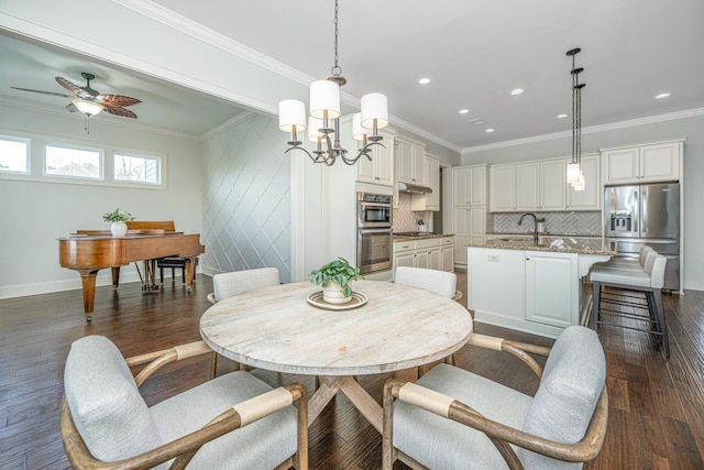 dining area featuring baseboards, dark wood-style flooring, recessed lighting, and crown molding