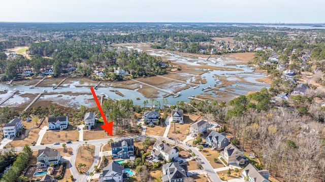 aerial view featuring a water view and a residential view