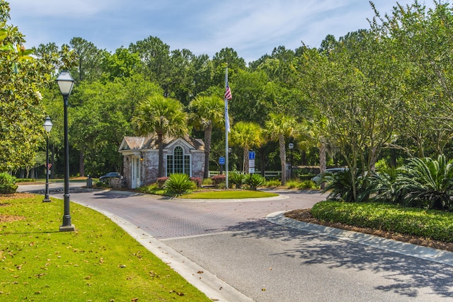 view of community featuring a yard