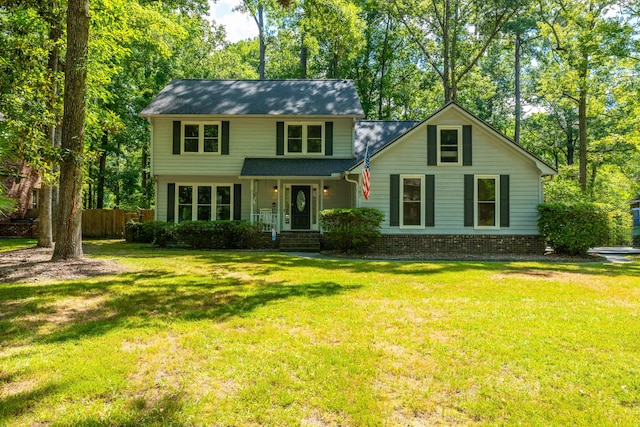 view of front of home with a front lawn