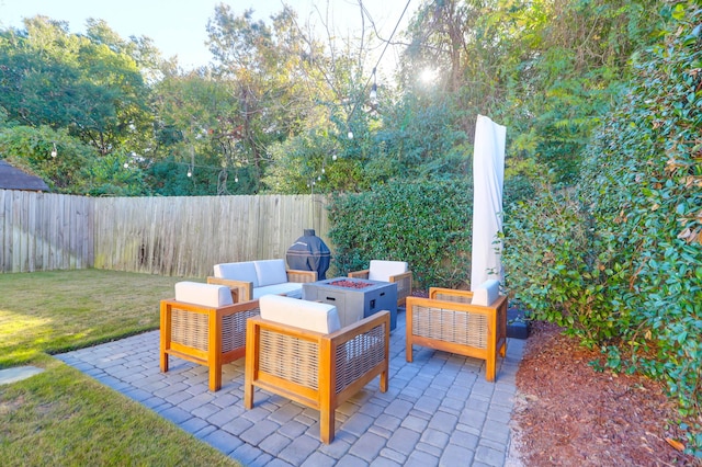 view of patio with an outdoor fire pit