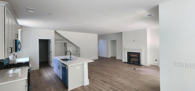 110 Saluda Dr, Santee, SC 29142 - kitchen with gas range, a sink, open floor plan, dishwashing machine, and light countertops