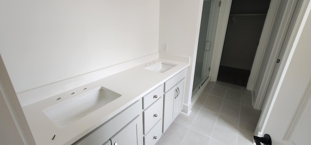 110 Saluda Dr, Santee, SC 29142 - full bath with a shower stall, double vanity, tile patterned flooring, and baseboards