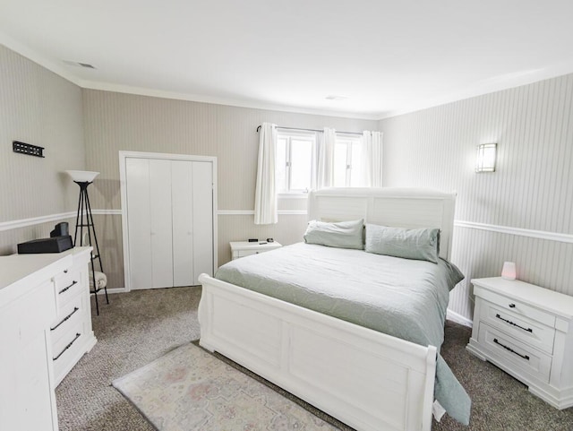 carpeted bedroom with crown molding