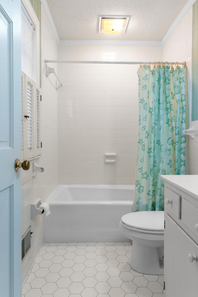bathroom with ornamental molding, toilet, shower / tub combo, and a textured ceiling