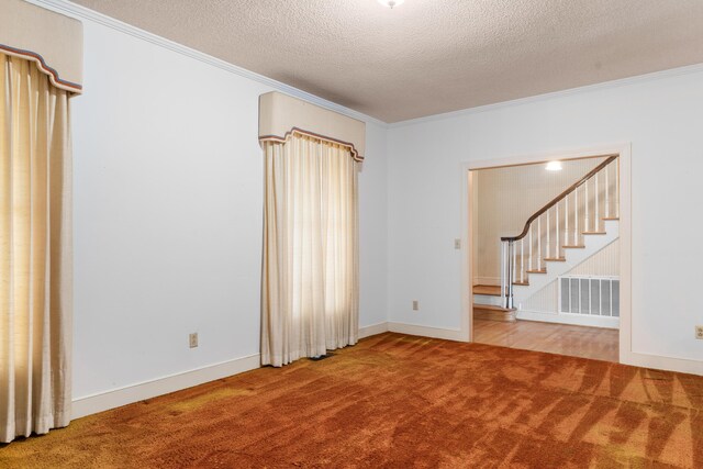 carpeted spare room featuring crown molding, stairs, visible vents, baseboards, and a textured ceiling