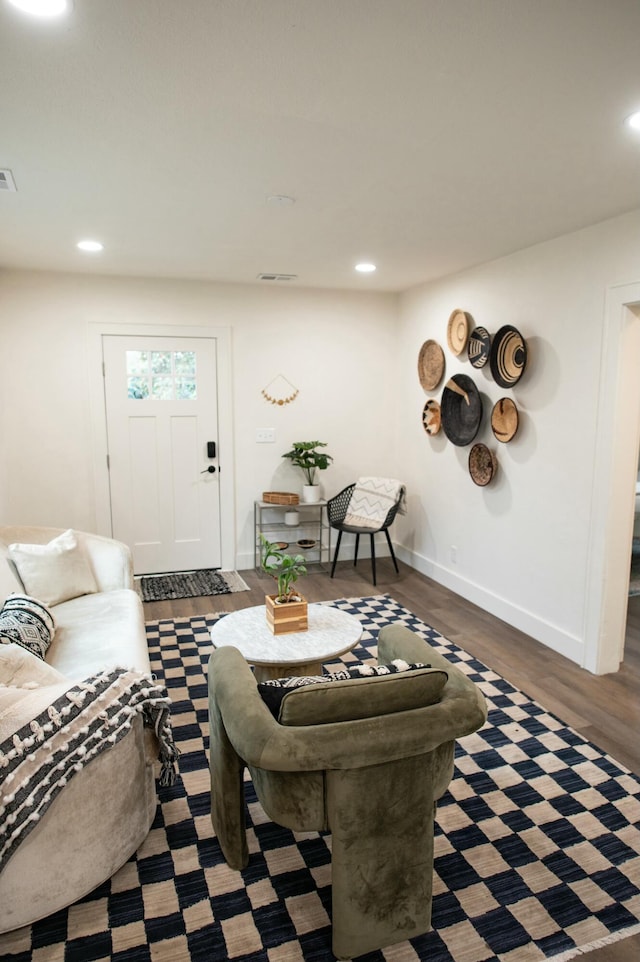 living room with dark hardwood / wood-style floors