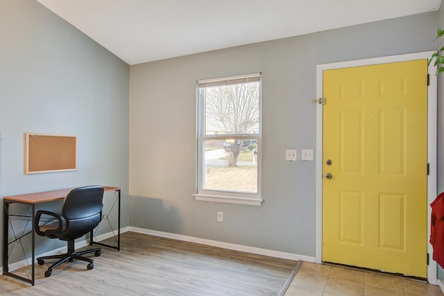 office space featuring light wood finished floors and baseboards