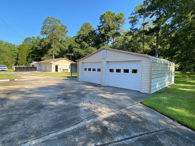 garage featuring a yard