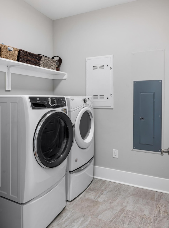 laundry room with independent washer and dryer and electric panel