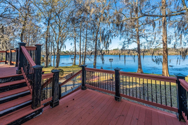 deck featuring a water view