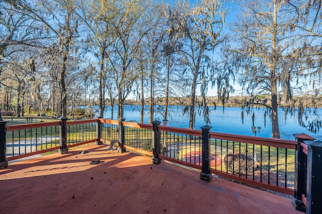 deck featuring a water view