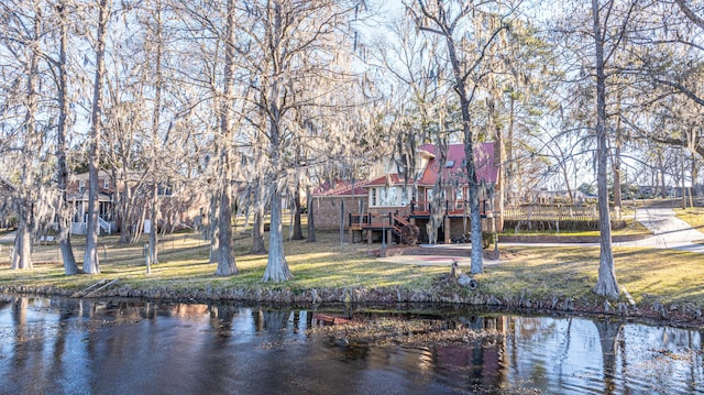 property view of water featuring stairway