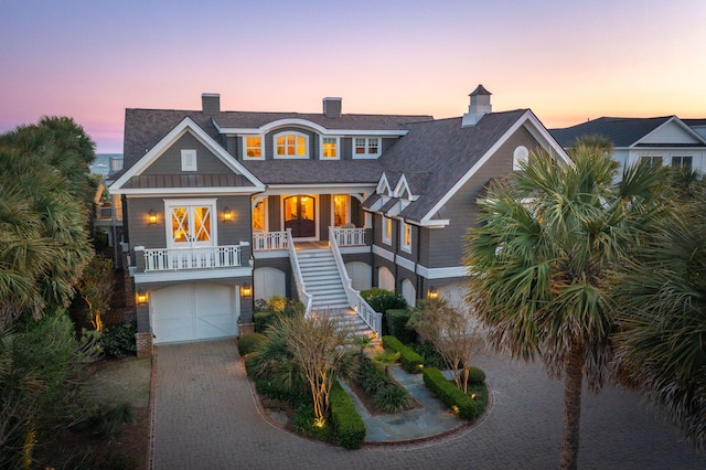 view of front of property featuring a garage