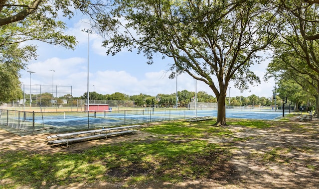 surrounding community featuring tennis court