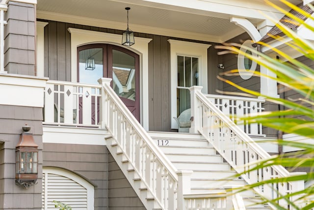 doorway to property featuring a porch