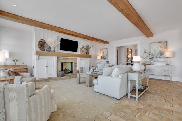 living room featuring beam ceiling