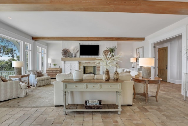 living room with beam ceiling