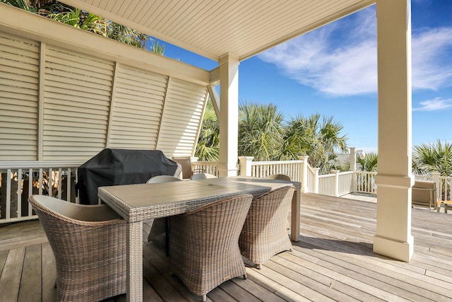 wooden terrace with area for grilling