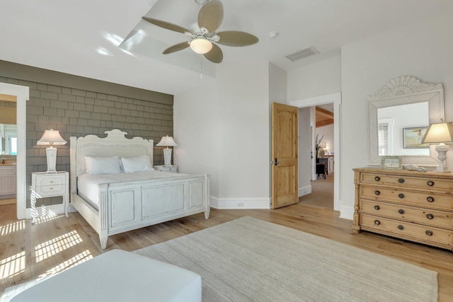 bedroom featuring light hardwood / wood-style flooring and ceiling fan