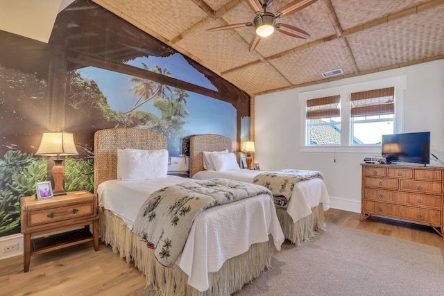 bedroom with hardwood / wood-style flooring and ceiling fan