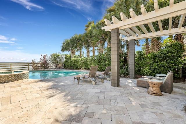 view of pool featuring a pergola, an in ground hot tub, and a patio