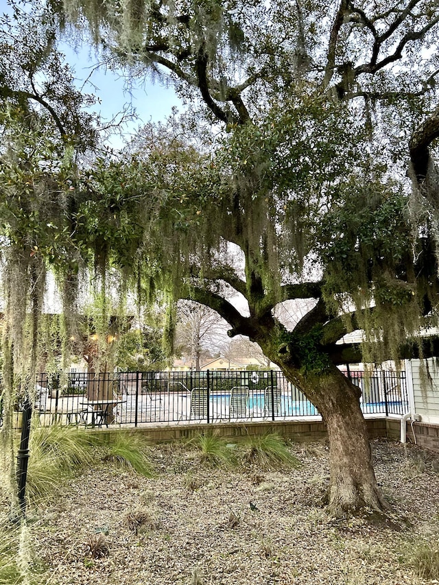 pool featuring fence