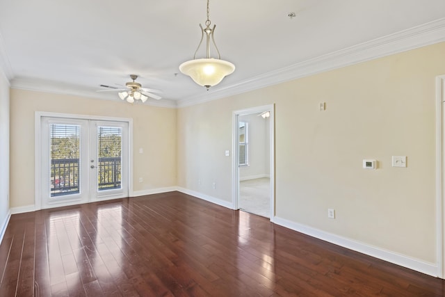 spare room with dark wood-style floors, french doors, and baseboards