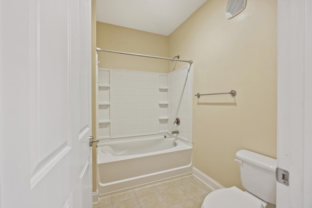 bathroom featuring visible vents, toilet, tile patterned flooring, baseboards, and bathing tub / shower combination