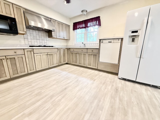 209 Myrtlewood Dr, Santee, SC 29142 - kitchen with black appliances, extractor fan, light countertops, and light wood-style flooring