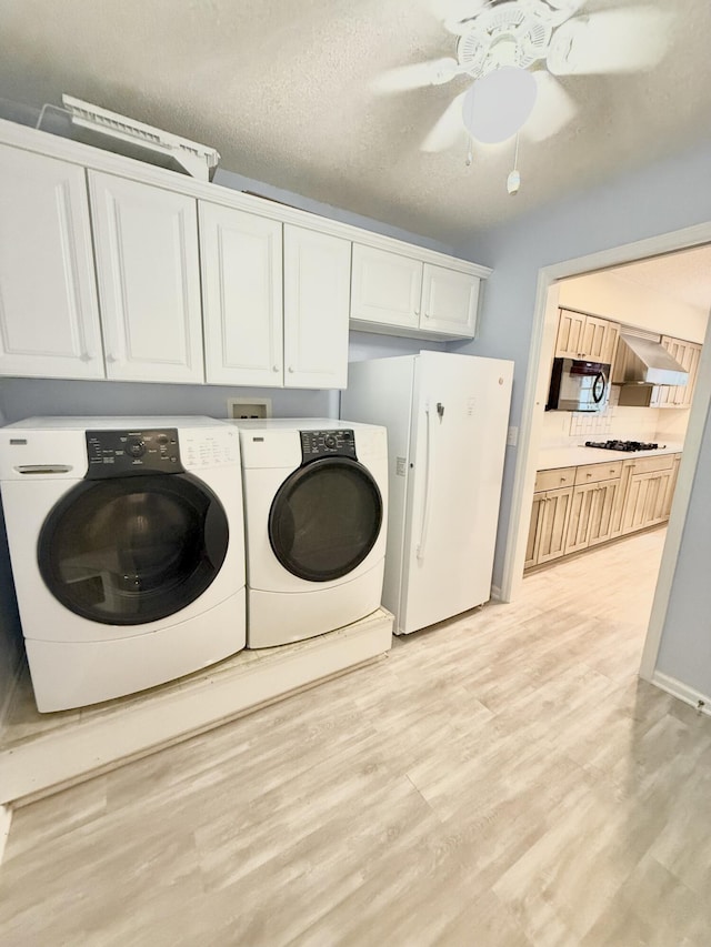 209 Myrtlewood Dr, Santee, SC 29142 - washroom featuring cabinet space, separate washer and dryer, light wood-style flooring, and ceiling fan
