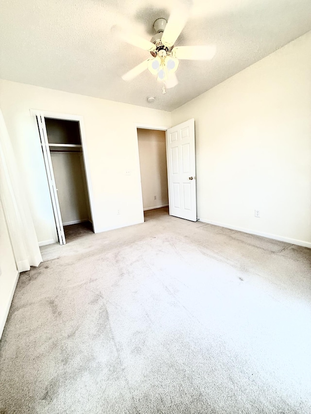 209 Myrtlewood Dr, Santee, SC 29142 - unfurnished bedroom with light colored carpet, a closet, ceiling fan, and a textured ceiling