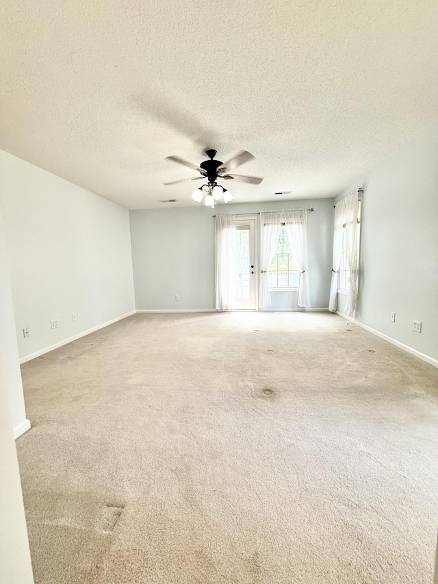 209 Myrtlewood Dr, Santee, SC 29142 - spare room featuring carpet floors, ceiling fan, and a textured ceiling