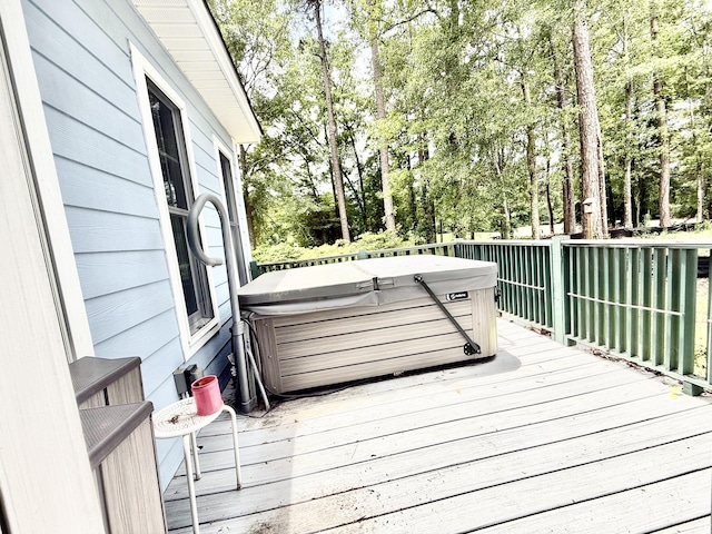 209 Myrtlewood Dr, Santee, SC 29142 - wooden terrace featuring a hot tub and view of scattered trees