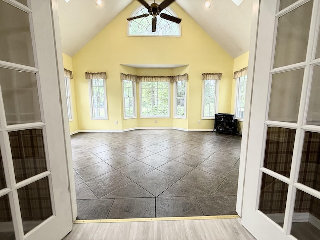209 Myrtlewood Dr, Santee, SC 29142 - empty room featuring a ceiling fan, high vaulted ceiling, and plenty of natural light