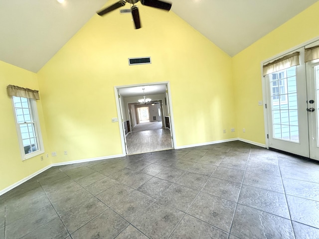 209 Myrtlewood Dr, Santee, SC 29142 - tiled spare room featuring ceiling fan, high vaulted ceiling, plenty of natural light, and a chandelier
