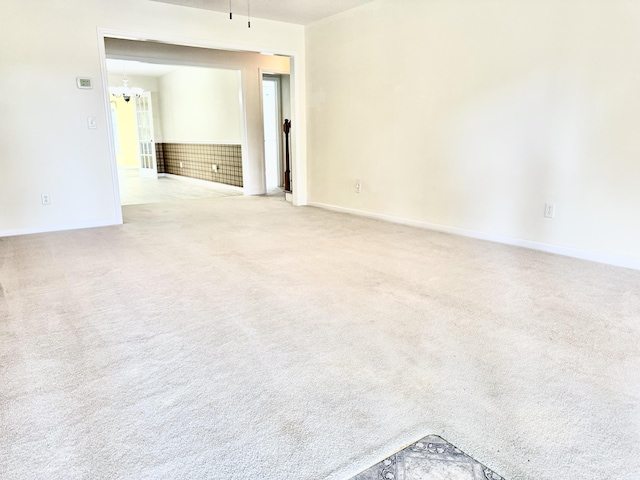 209 Myrtlewood Dr, Santee, SC 29142 - spare room with carpet floors and a chandelier