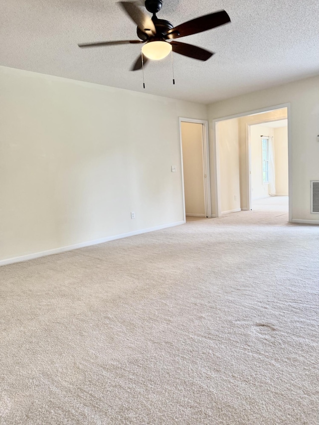 209 Myrtlewood Dr, Santee, SC 29142 - empty room featuring light carpet, ceiling fan, and a textured ceiling