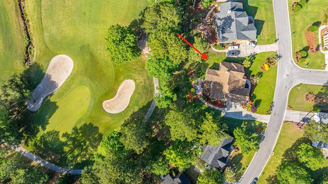 bird's eye view with view of golf course