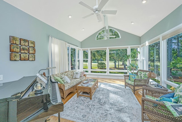 sunroom / solarium with high vaulted ceiling, beam ceiling, recessed lighting, and wood finished floors