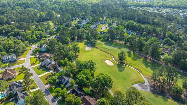 aerial view featuring view of golf course and a residential view