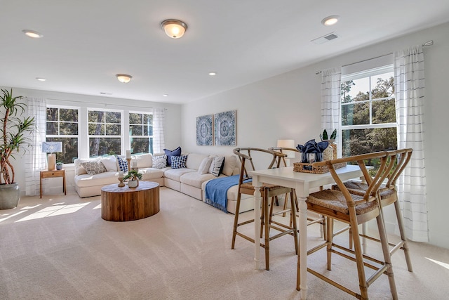 living room with light carpet