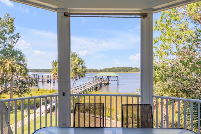 exterior space with a water view