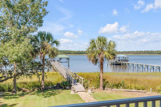 dock area with a water view