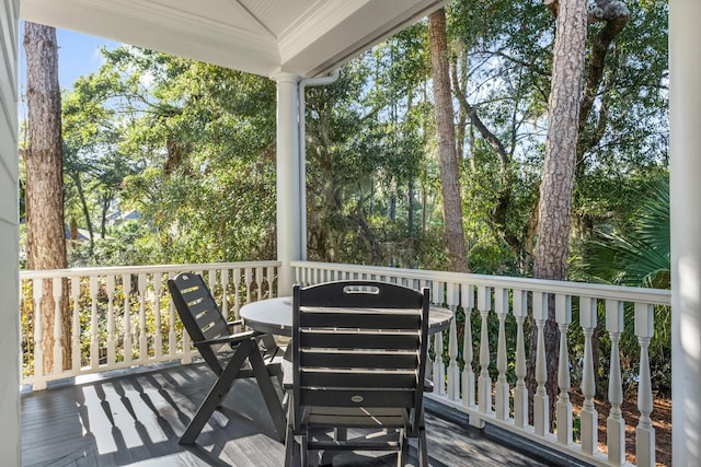 wooden deck with outdoor dining area