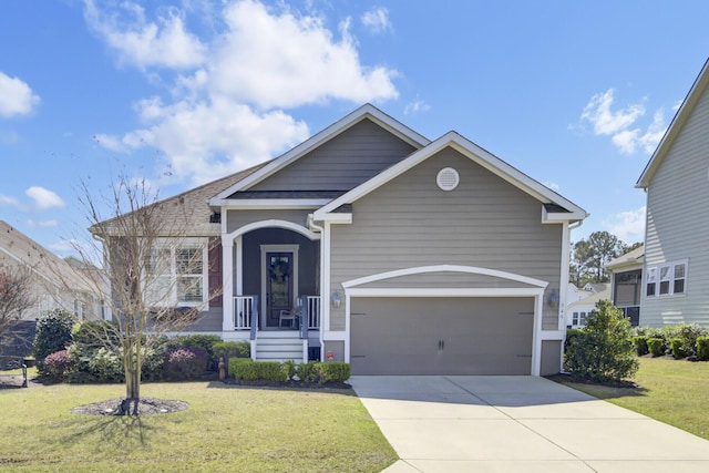 345 Turnstone St, Mount Pleasant, SC 29464 - view of front of house with a front lawn, a garage, and concrete driveway